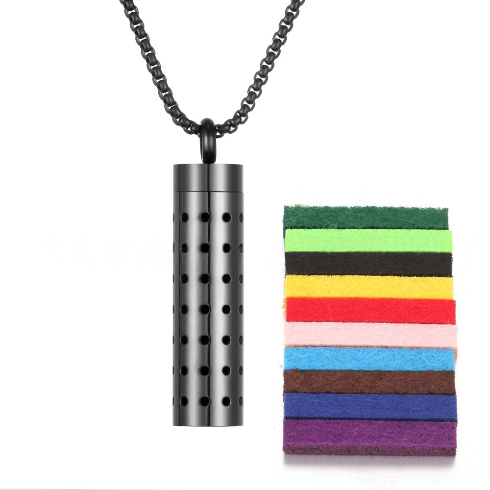 Premium aromatherapy essential oil diffuser pendant with black dot pattern on silver titanium steel
